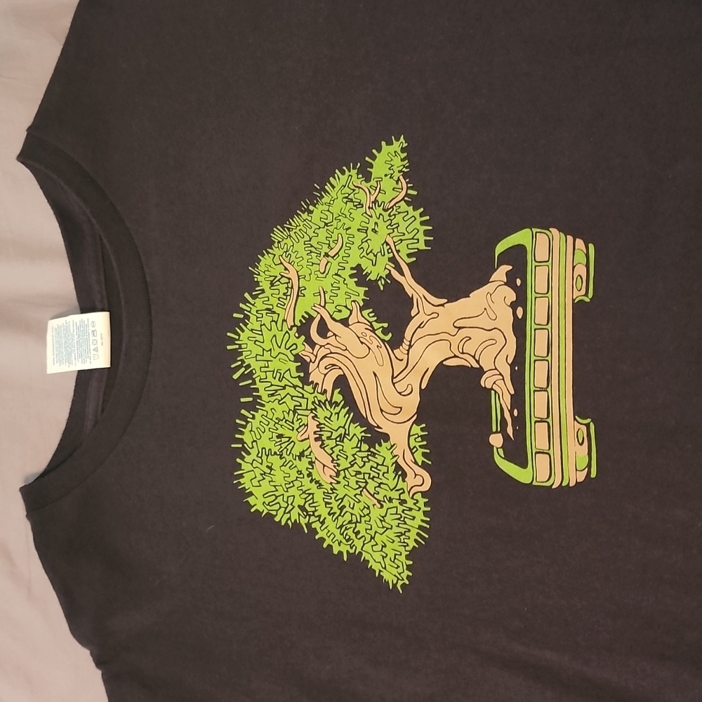 A black tee with a Bonsai tree on the front